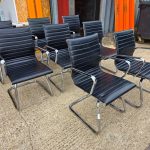 AMCA Cantilever Black Meeting Chairs Faux Leather Seat Chrome Frame - Set of 8