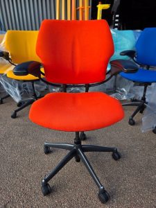 Refurbished Humanscale Freedom ergonomic office chair in Orange fabric with brand new upholstery UK stock