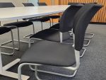 KMeeting Table w/ 10 Stacking Black Fabric Chairs - Set. 2x PALLETS DELIVERY - Image 8