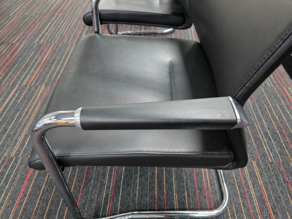 Black chair with a chrome