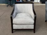Elegant Textured Upholstered Armchair – Light Grey Fabric with Dark Wood Frame