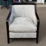 Elegant Textured Upholstered Armchair – Light Grey Fabric with Dark Wood Frame
