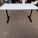 IKEA Bekant Office Desk - Height Adjustable with White Top and Black Frame
