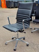 Black Swivel Office Chair with Chrome Arms and Base on Wheels - Faux Leather