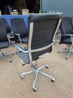 Black Swivel Office Chair with Chrome Arms and Base on Wheels - Faux Leather - Image 2