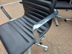 Black Swivel Office Chair with Chrome Arms and Base on Wheels - Faux Leather - Image 5