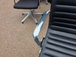 Black Swivel Office Chair with Chrome Arms and Base on Wheels - Faux Leather - Image 7
