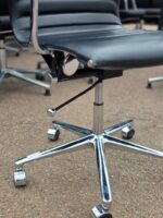 Black Swivel Office Chair with Chrome Arms and Base on Wheels - Faux Leather - Image 8
