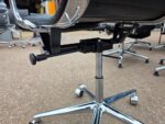 Black Swivel Office Chair with Chrome Arms and Base on Wheels - Faux Leather - Image 16