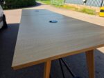 Office Collaboration Table | Oak-Effect Top | Cable Ports | Black Frame - 320cm - Image 13