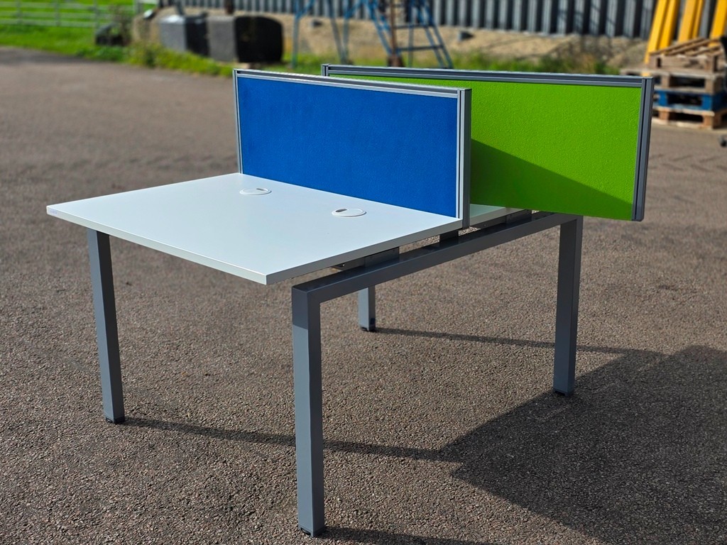Double 2 person white bench desk back-to-back workstation with cable ports outside the My Used Furniture warehouse