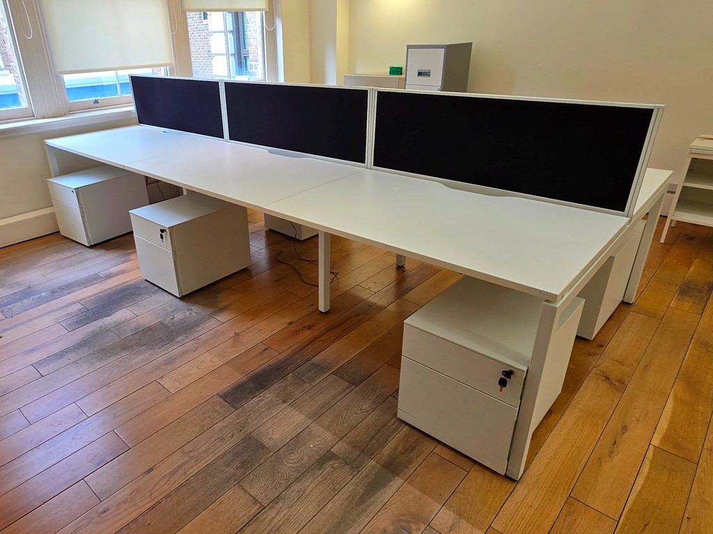 Bench desks arranged in a shared office layout