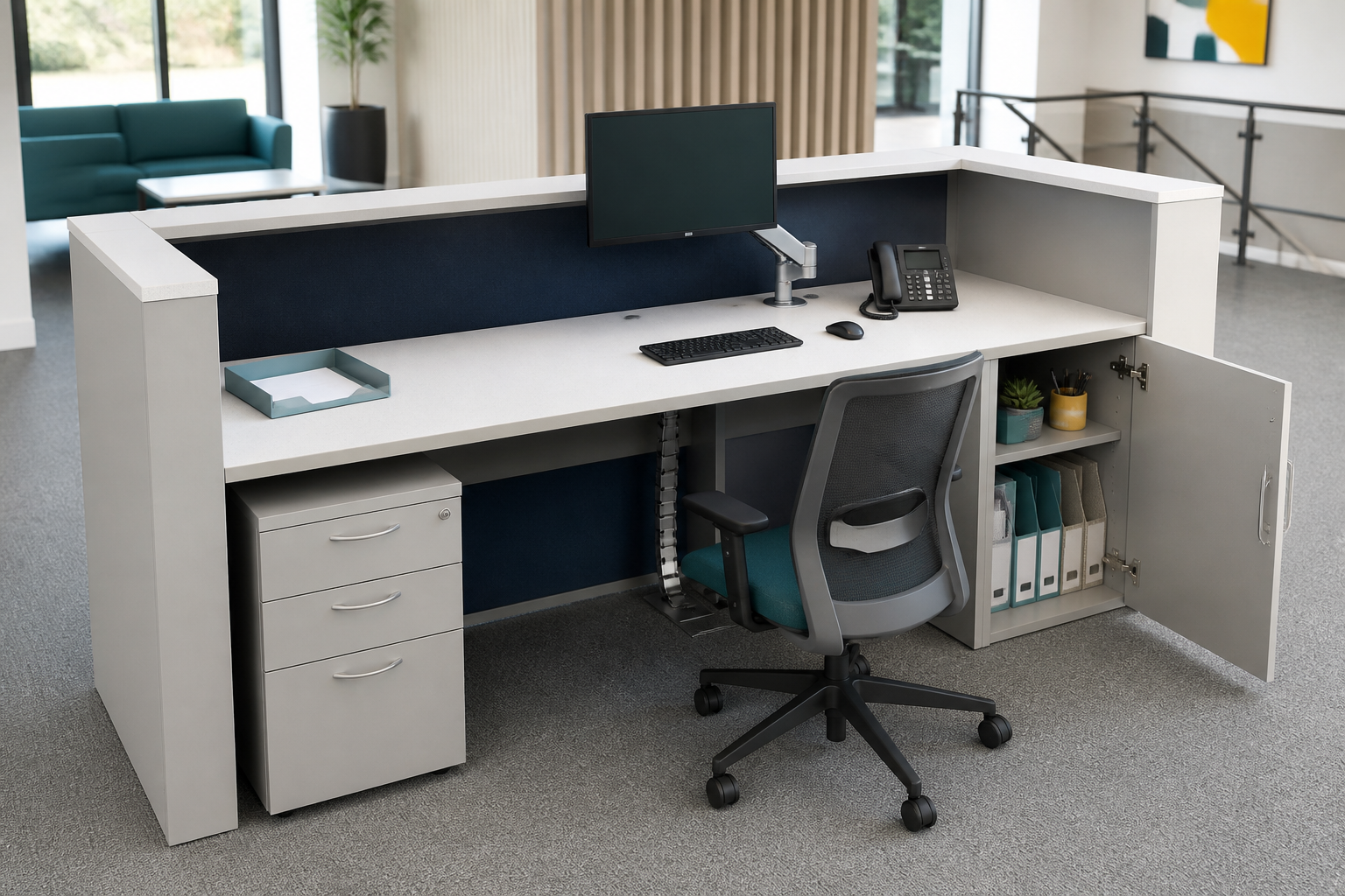 Reception staff workstation with monitor, storage and concealed cable management